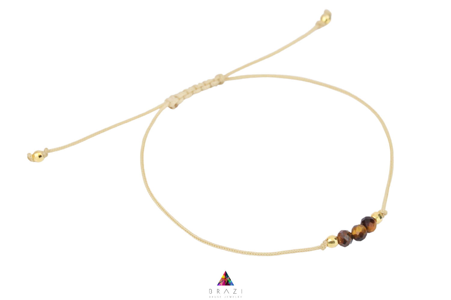 Bransoletka z kulistym tygrysim okiem na czarnym sznurku, biżuteria handmade marki Brazi