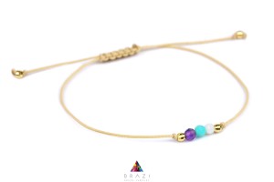 Elegancka bransoletka z motywem znaków zodiaku Ryby, idealna dla osób ceniących astrologię i styl. Wykonana z najwyższej jakości materiałów, doskonale dopełni każdą stylizację.