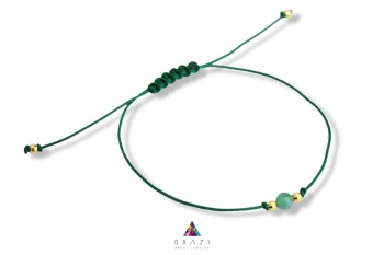 Bransoletka Szczęścia Brazi Druse Jewelry: szmaragdowa, minimalistyczna bransoletka z zielonym szmaragdem.