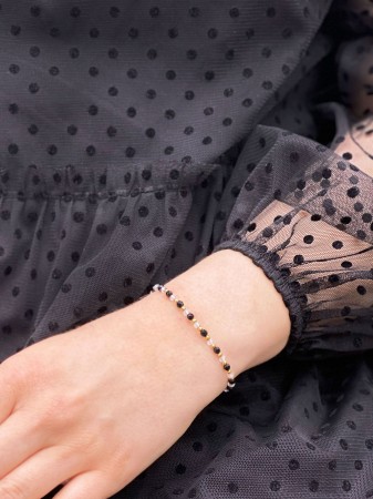 Elegancka bransoletka z kryształem górskim i turmalinem, idealna do podkreślenia stylu. Naturalne kamienie o wyjątkowym blasku dodają uroku i klasy każdej stylizacji. Idealny wybór na prezent.