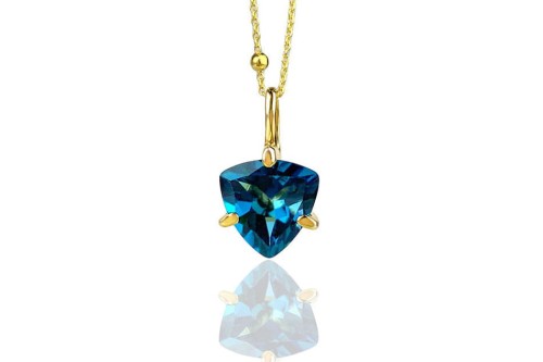 Elegancki naszyjnik z topazem London Blue o masie 4 ct, oszlifowany w kształcie tryliona. Idealny wybór dla miłośników wyrafinowanej biżuterii, dodający blasku każdej stylizacji.