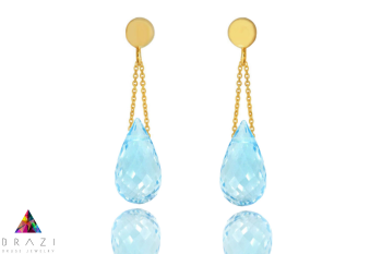 Złote kolczyki z błękitnym topazem Sky Blue w formie fasetowanych kropli na podwójnych łańcuszkach, marka Brazi.