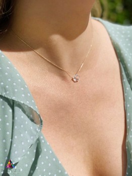 Naszyjnik z kryształu górskiego w kształcie gwiazdki na złotym łańcuszku, biżuteria Brazi