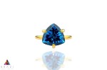 Pierścionek Topaz London Blue 4 ct. Trylion złoto 585