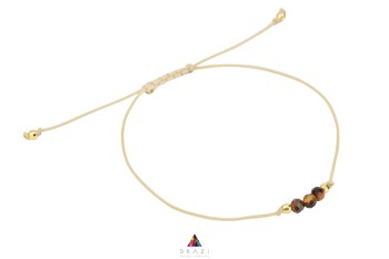 Bransoletka Brazi Druse Jewelry z Tygrysim Okiem, minimalistyczna, na sznurku.