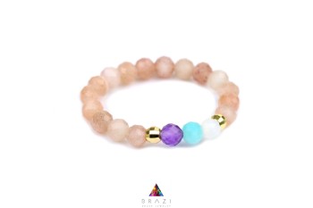 Pierścionek z fasetowanym ametystem i akwamarynem na złotej obrączce, biżuteria marki Brazi