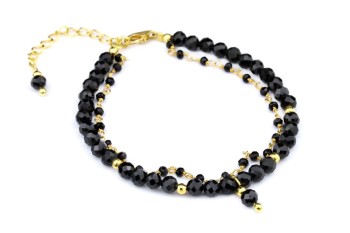 Elegancka, dwurzędowa bransoletka Brazi Druse Jewelry z turmalinu i spinelu, czarne fasetowane kamienie, złote zapięcie.