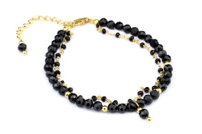 Elegancka, dwurzędowa bransoletka Brazi Druse Jewelry z turmalinu i spinelu, czarne fasetowane kamienie, złote zapięcie.