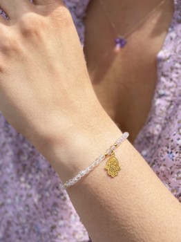 Bransoletka Brazi Druse z kryształu górskiego, złota zawieszka Hamsa.