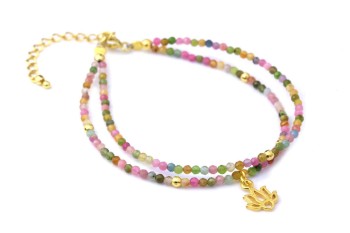 Podwójna bransoletka z kolorowym turmalinem, złotymi elementami i zawieszką lotosu, biżuteria Brazi