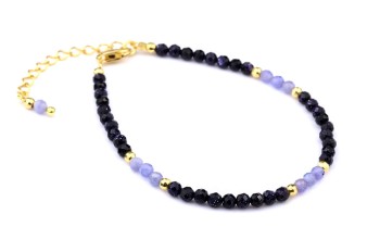 Bransoletka z fasetowanych tanzanitów i nocy kairu ze złotymi przekładkami oraz zapięciem, marka Brazi.