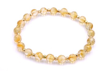 Bransoletka Cytryn fasetowany, złota oprawa.