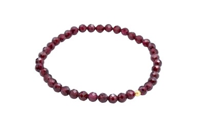 Bransoletka z naturalnego fasetowanego granatu ze złotym elementem ozdobnym, biżuteria Brazi.